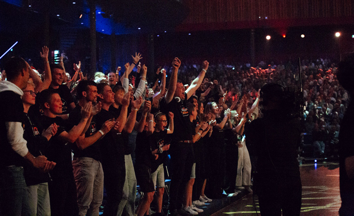 Team 10 celebrates their first-place victory. They represent the United States, Germany, the Netherlands, and Norway.