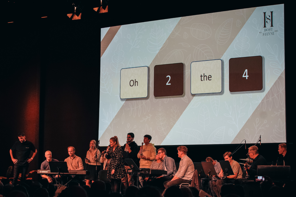 On stage, fellow believers from England, Poland, Germany and Norway contributed.